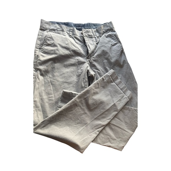 Tommy Hilfiger Men's TH Flex Stretch Slim-Fit Chino Pants in light gray. 32 x 32 - Picture 8 of 16